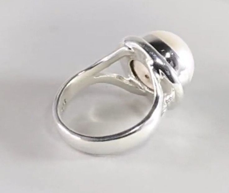 The Lustrous Pearl Solitaire: Handcrafted Silver Ring